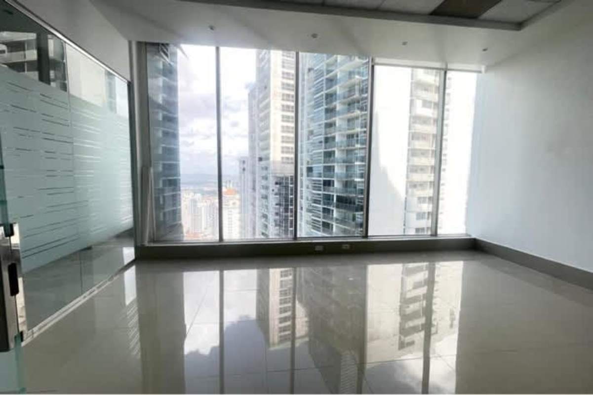 Open office with floor-to-ceiling windows and tile floor at PH BICSA Tower Panama