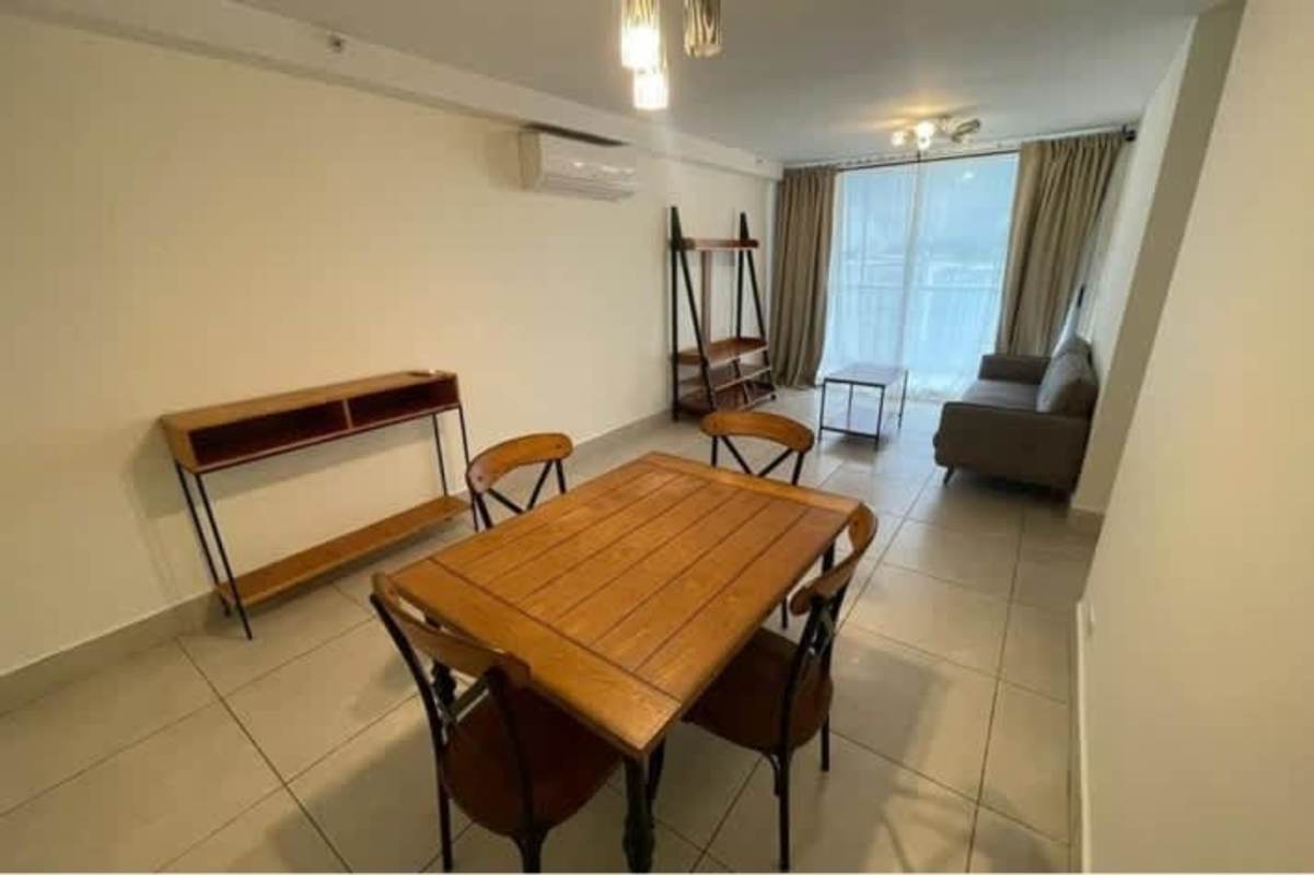 Modern living dining room with large window tile floors PH Sky Point Towers Panama