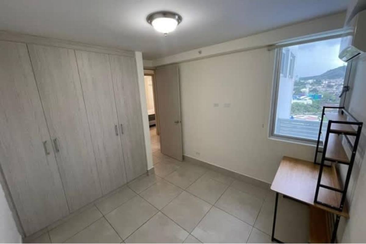 Bedroom with large window and closet PH Sky Point Towers Betania Panama City