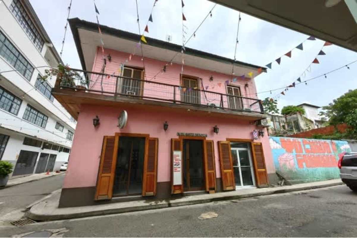Ground floor street retail shops Casa Alba building Casco Viejo vibrant murals