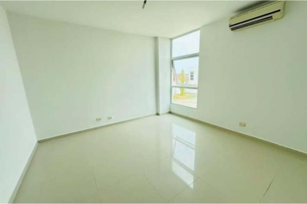 Contemporary house with covered parking and lawn in Costa Sur Panama