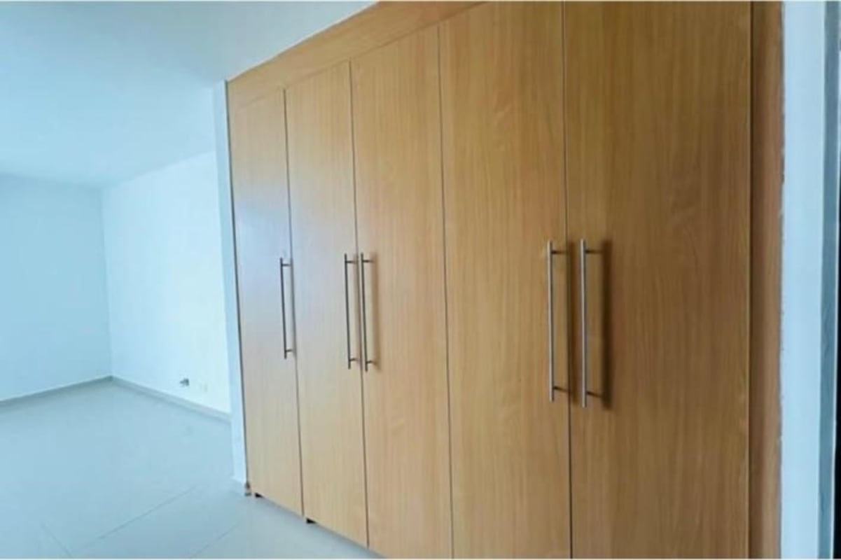 Spacious living-dining with sliding glass doors to terrace in Costa Sur home