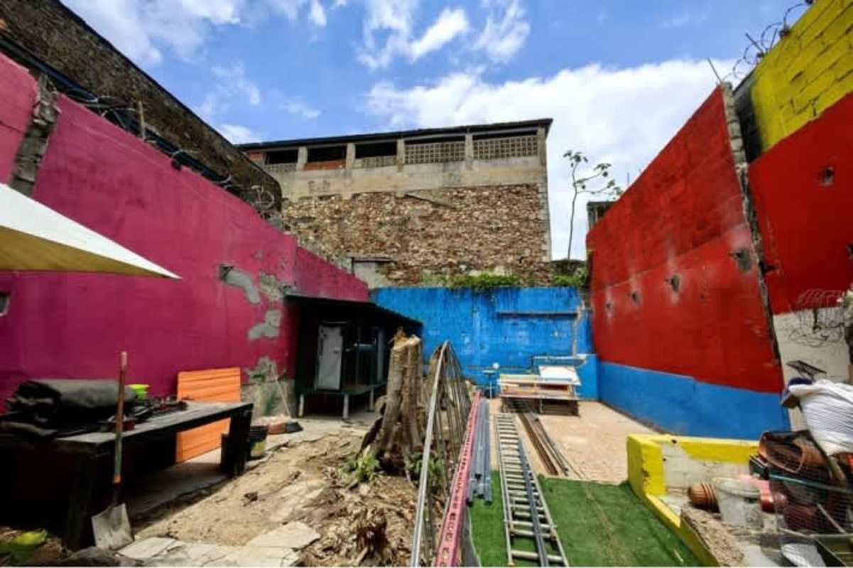 Historic colonial facade with balcony and murals Casco Viejo Panama City