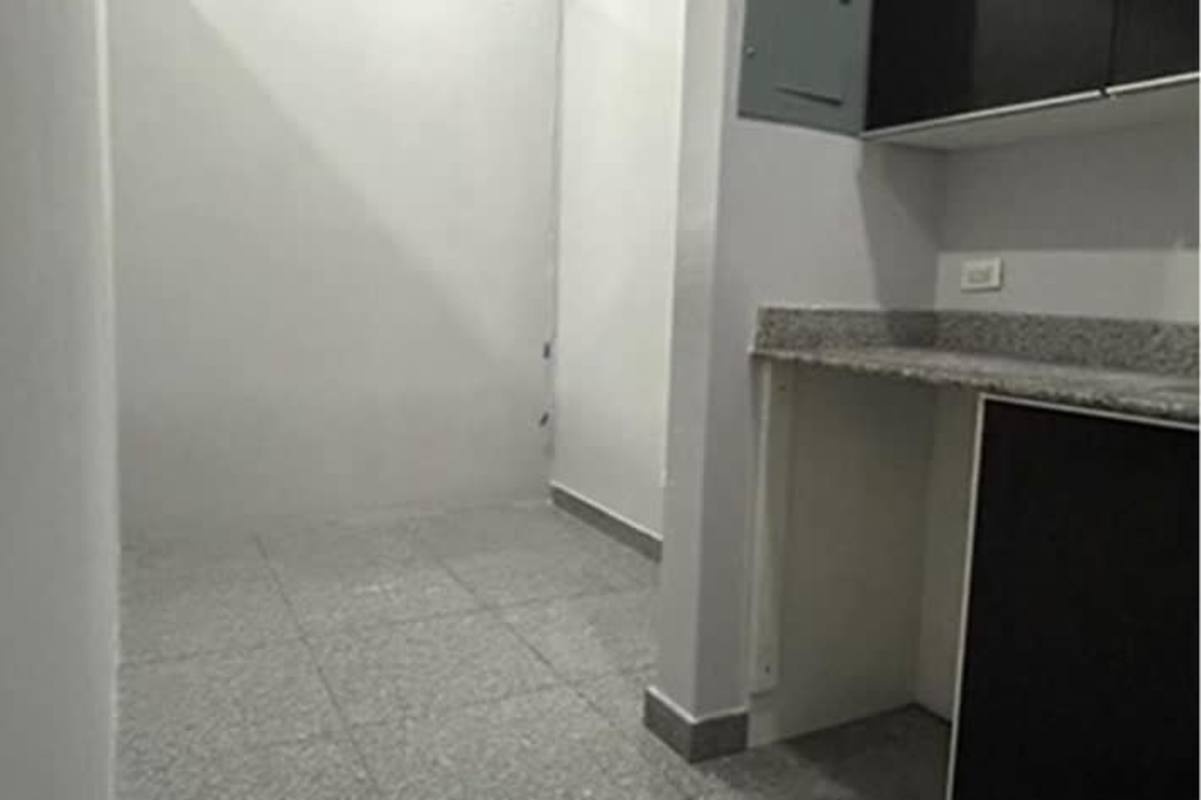 Partitioned interior workspace with city view at PH BICSA Tower Calle 50 Panama