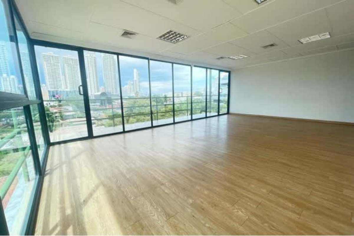 Empty executive office with tile floors and large window city view PH BICSA Tower Panama