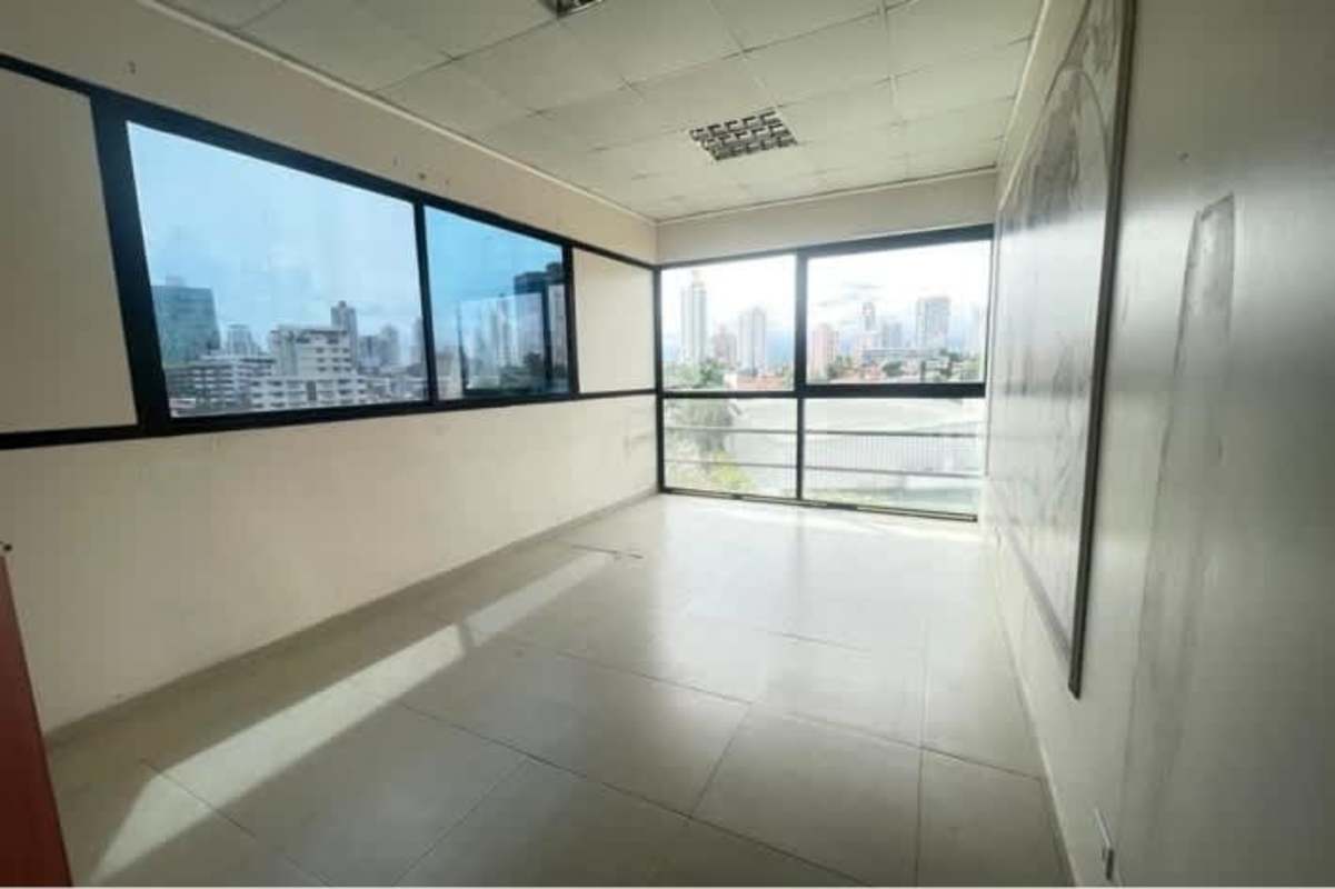 Spacious empty modern office floor-to-ceiling windows city skyline PH BICSA Tower Panama