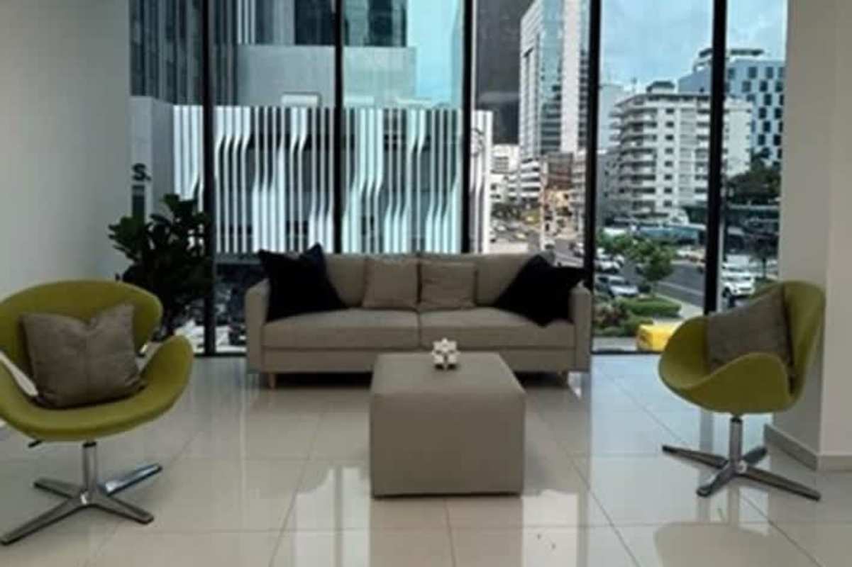 Open-plan workspace with glass partitions in PH BICSA Financial Center Panama City