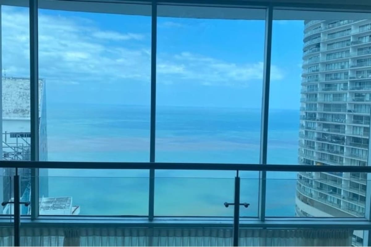 Elegant marble lobby with concierge service and seating Pacific Village Panama City