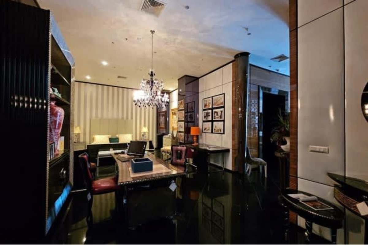 Interior photo of large commercial space in banking district with mezzanine ready for offices or showroom