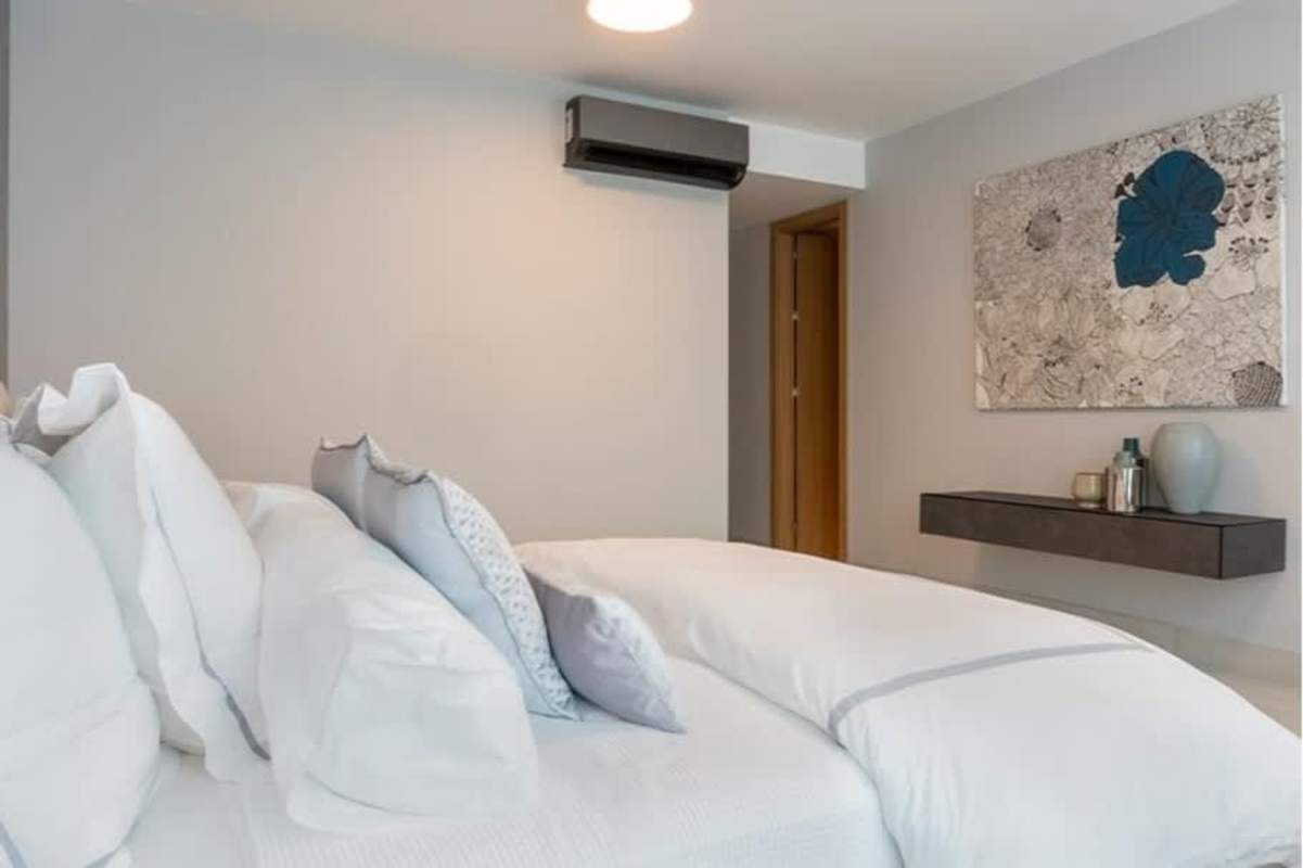 Bedroom with large window closet city skyline view PH Coco del Mar Panama