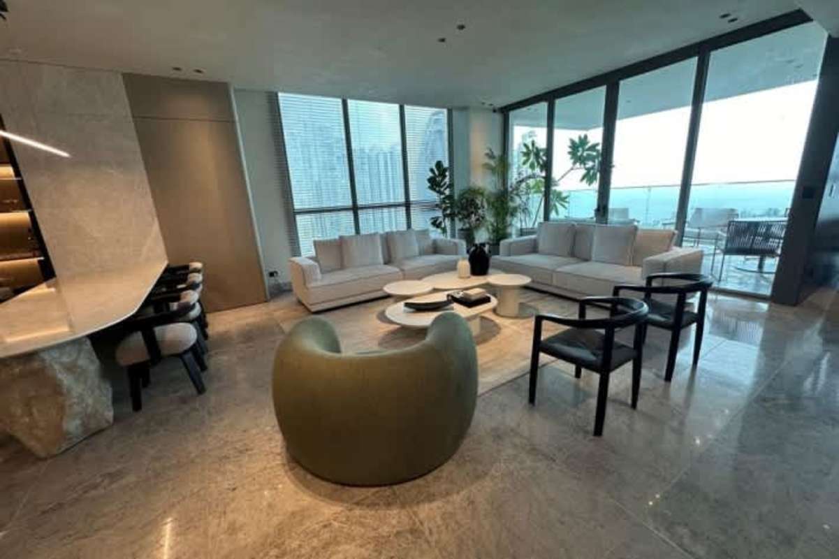 Modern dining area with marble floors, ocean views in PH Sea Point Punta Paitilla Panama
