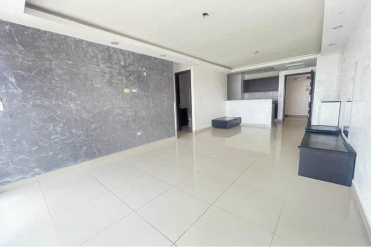 Open plan kitchen with granite countertop flowing to living area PH Villa de Las Fuentes Panama