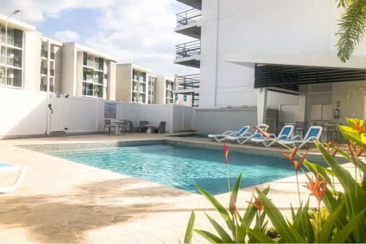 Modern apartment complex external view balconies parking PH Panama Viejo Residences Panama City