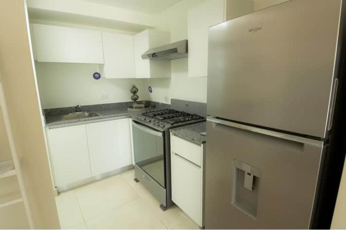 Minimalist bedroom with built-in closet window PH Panama Viejo Residences Panama