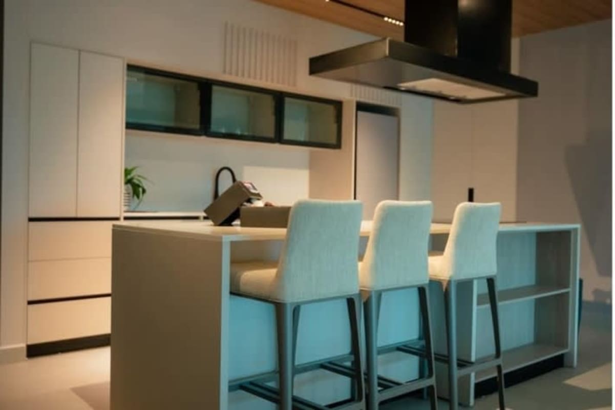 Bedroom with queen bed, large window city view at Uptown Condo-Suites Panama