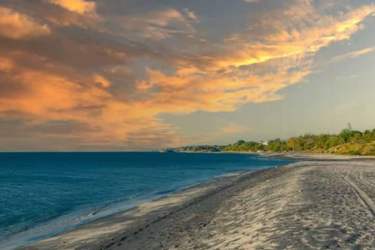 Bright master bedroom with large windows, walk-in closet in Terra Viva Coronado eco-friendly home Panama