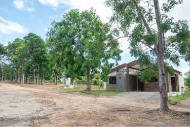 European style kitchen with quartz countertops and bright layout in eco-friendly house Panama