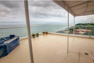 Terrace with glass railing, ocean views, Farallon Panama rental condo