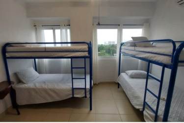 Comfortable living room with dining area and ocean view terrace access Farallon Tower Panama