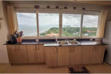 Contemporary kitchen with panoramic Pacific views in coastal condo Farallon Panama