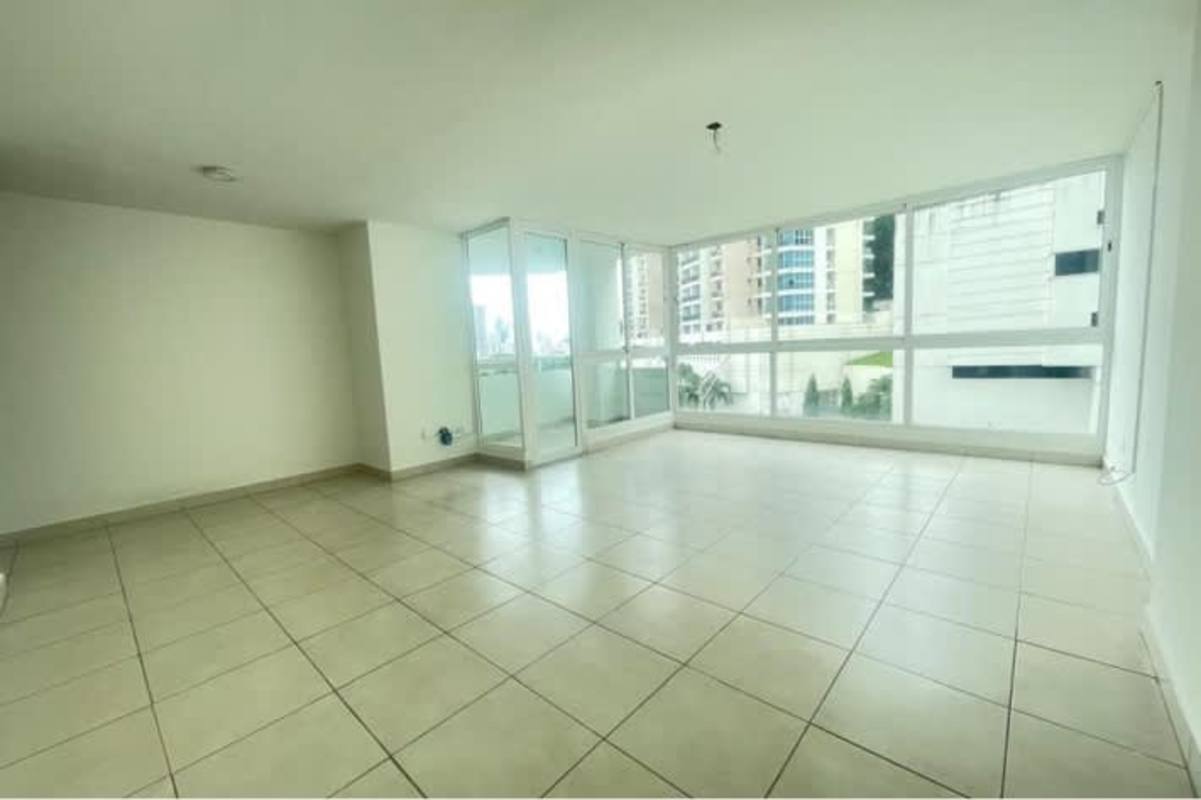 Bright living area with balcony access PH Edison Park apartment Betania Panama