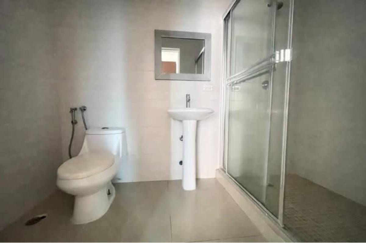 Modern bathroom with glass shower sliding doors and shelving PH El Cangrejo Bella Vista Panama