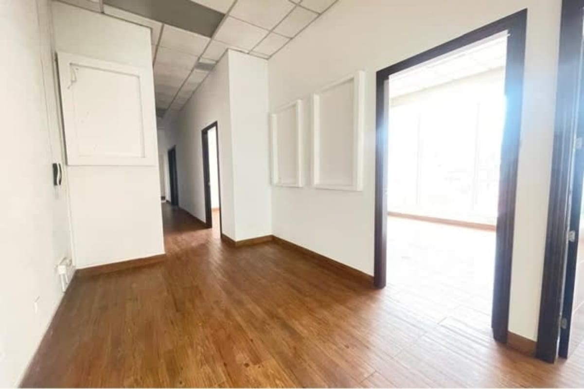Spacious hallway with wood floors in the office unit located in PH BICSA Tower in Panama City