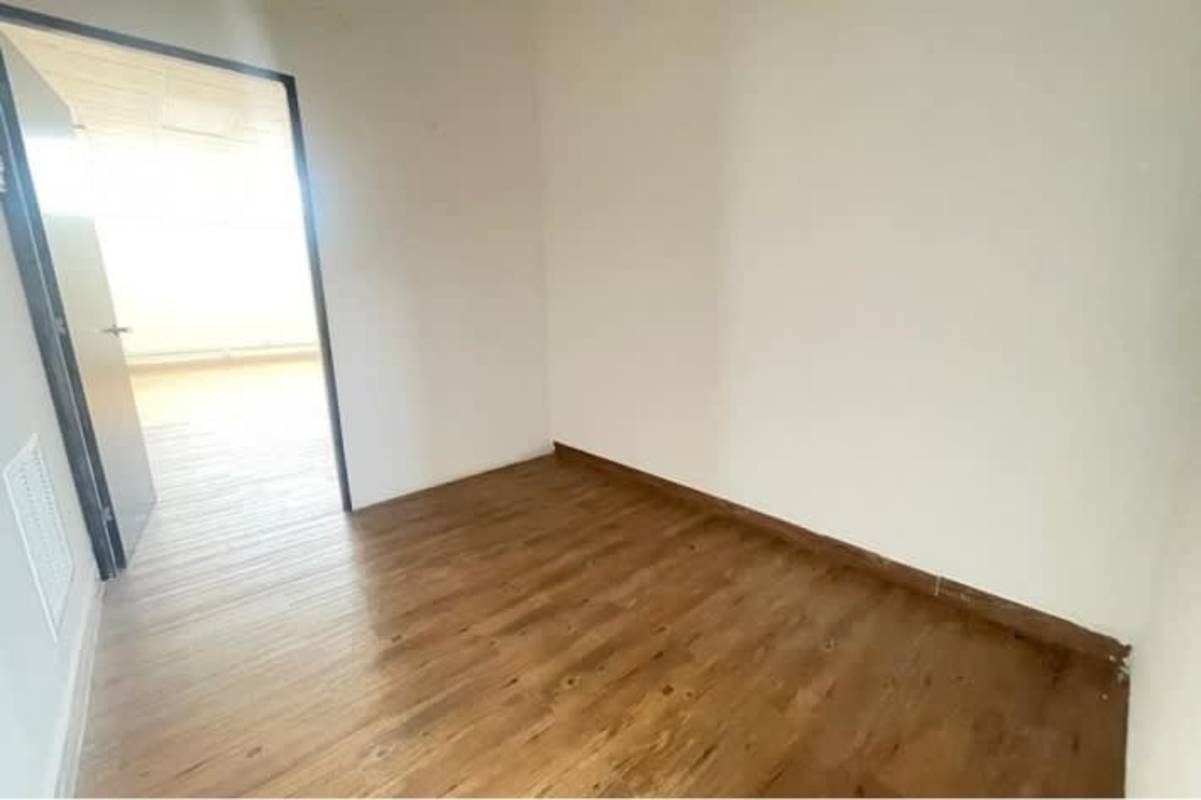 Large open office with bright light, wood vinyl floors, city views in PH BICSA Financial Tower Panama