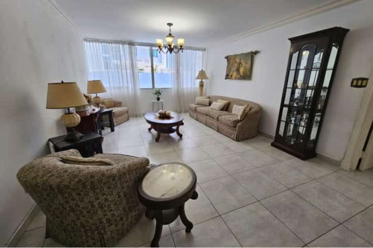 Traditional furnished living room with large windows, sofas, dining in Marbella PH Mar Plaza Panama