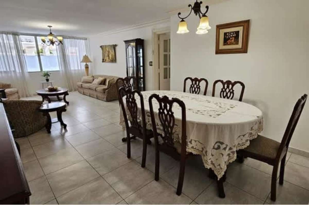 Living space with sofas, large windows, traditional décor and AC PH Mar Plaza Marbella Panama