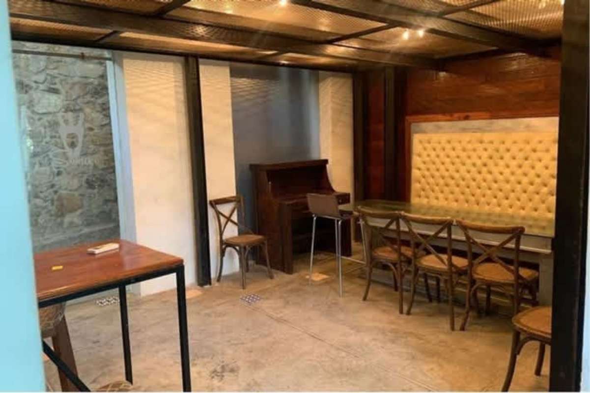 Rustic industrial wine cellar with bottle racks historic building Casco Viejo Panama