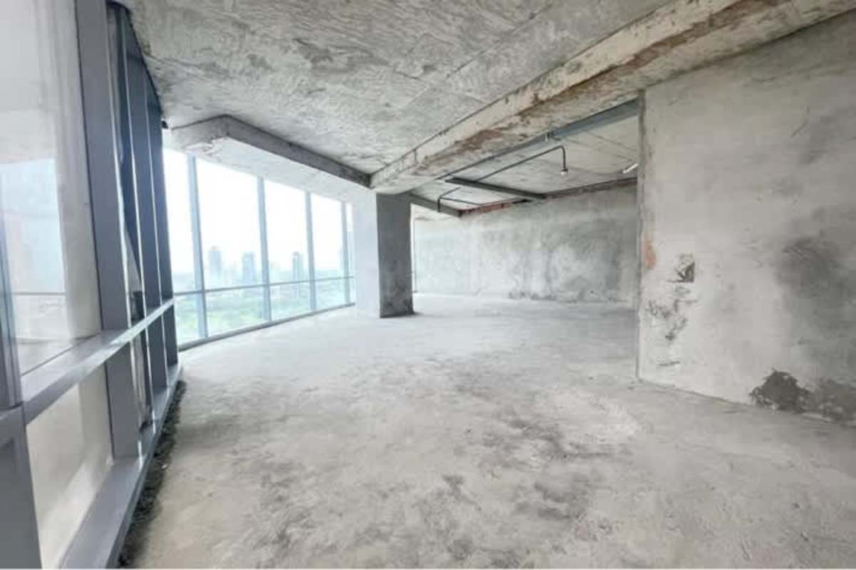Unfinished commercial space with expansive glass offering panoramic views from Park Tower in Costa del Este Panama