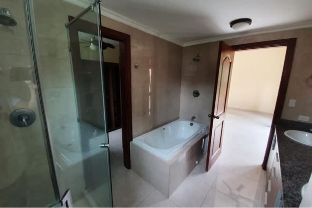 Elegant bathroom with shower and tub luxury house Senderos de Clayton Panama