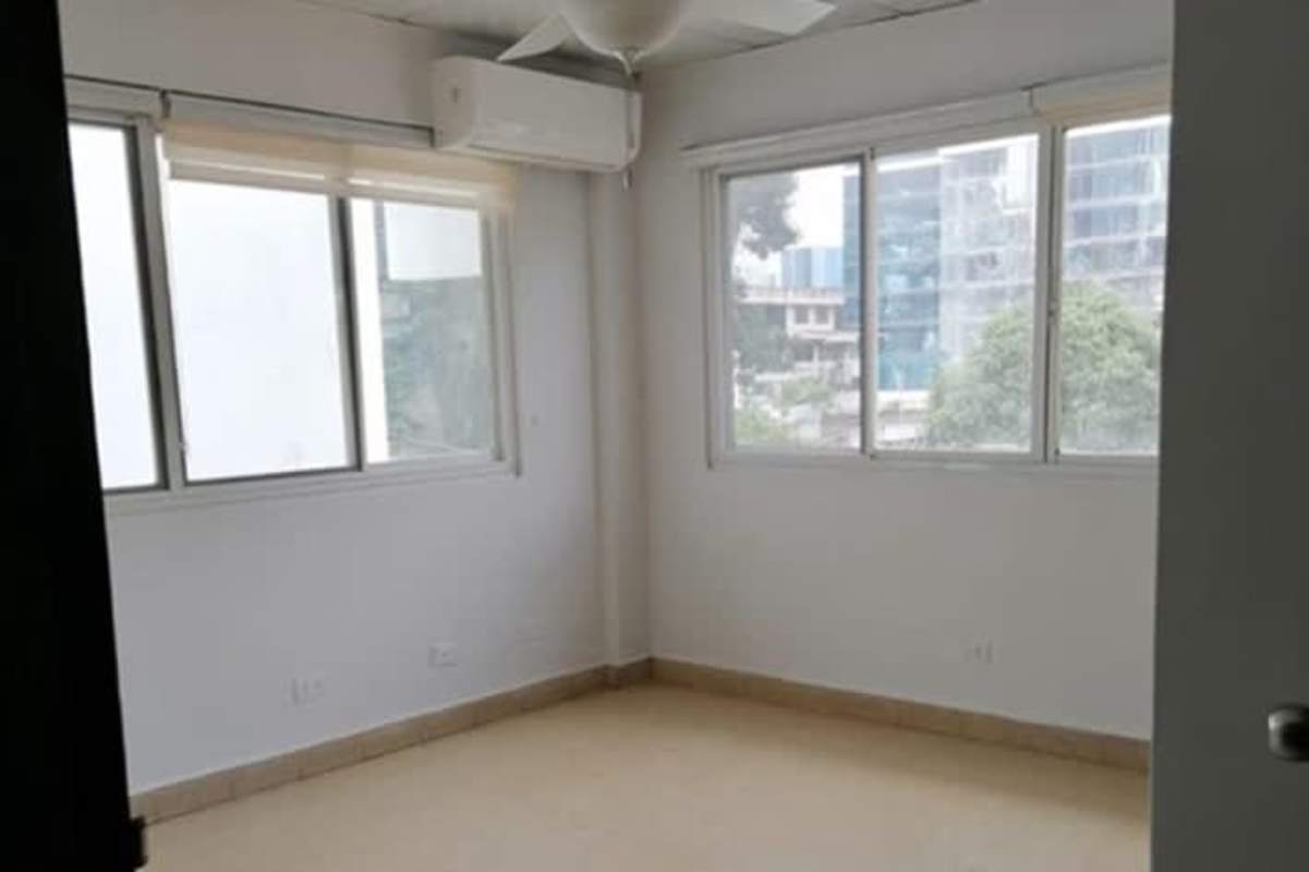 Bedroom with large built-in wooden closet PH Obarrio Plaza Panama rental