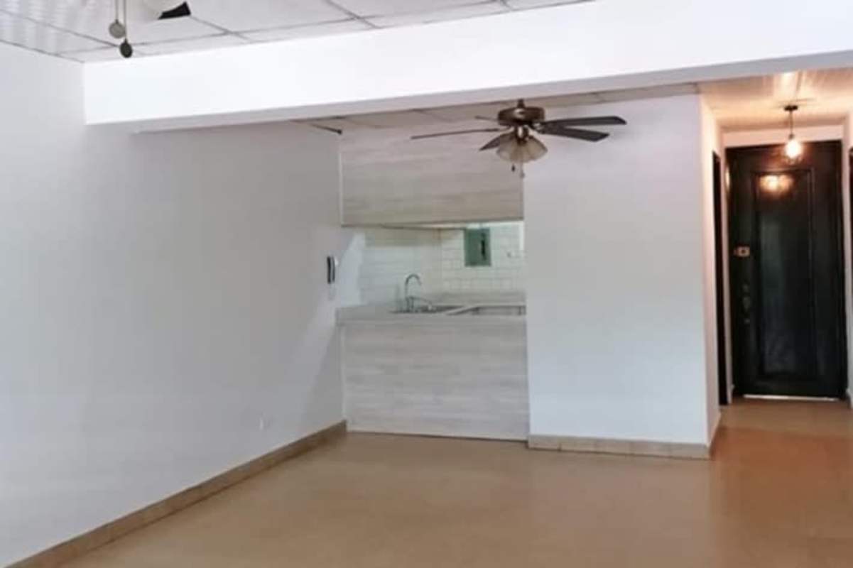 Living dining area open plan with kitchen view PH Obarrio Plaza apartment Panama