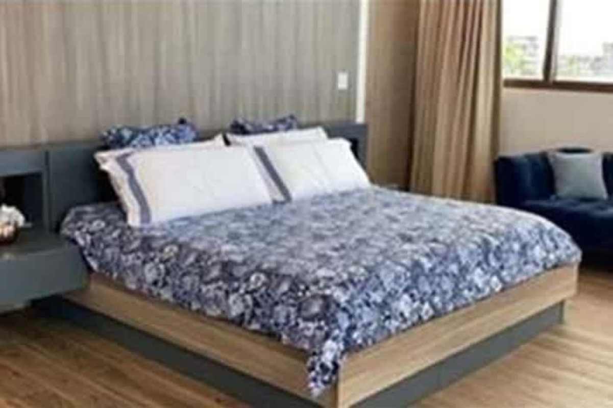 Bright modern living room with floor-to-ceiling windows and skyline views on Ocean Reef Islands Panama