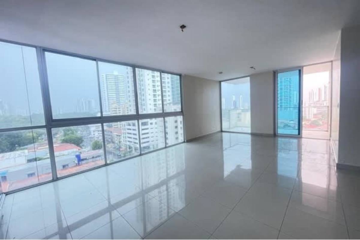 Contemporary kitchen with granite countertops, double sink, large window in PH San Francisco Bay Panama City apartment