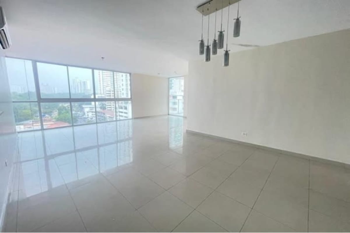 Bedroom with built-in wardrobe, panoramic window with skyline view in PH San Francisco Bay Panama City