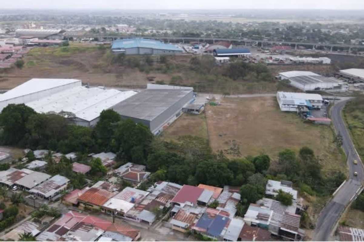 Modern elevated Mañanitas Metro station with surrounding commercial and residential neighborhoods near land for sale Tocumen Panama