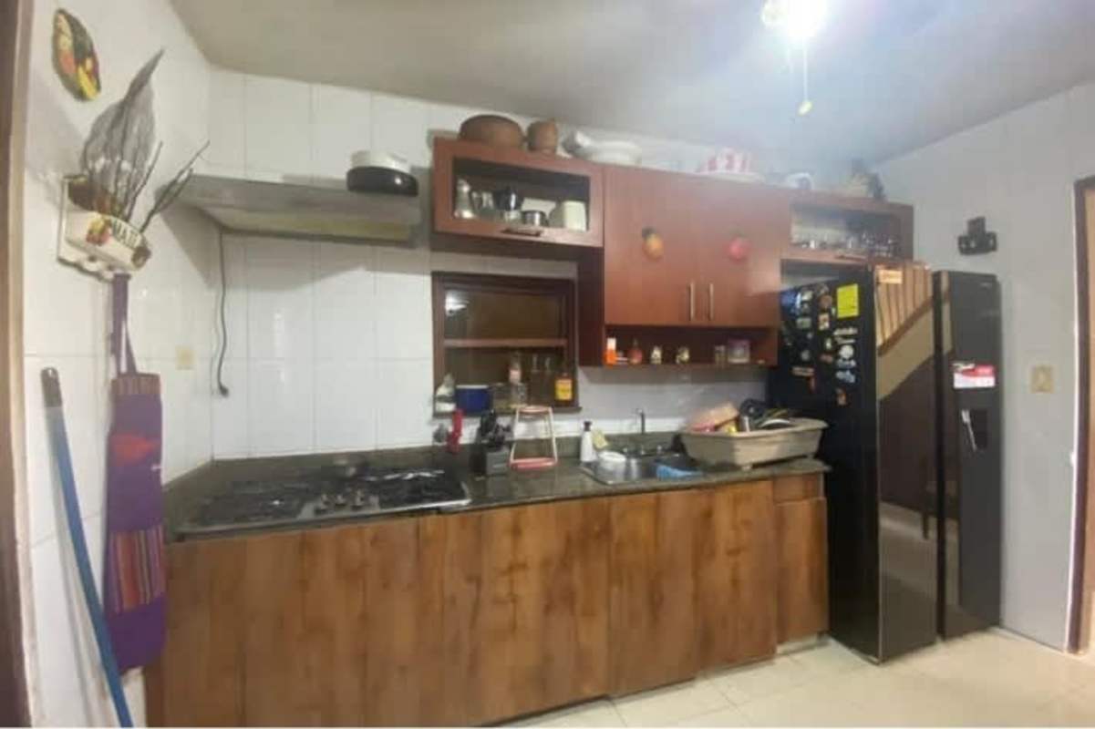 Bedroom featuring large windows, AC unit and closet Las Cumbres Panama