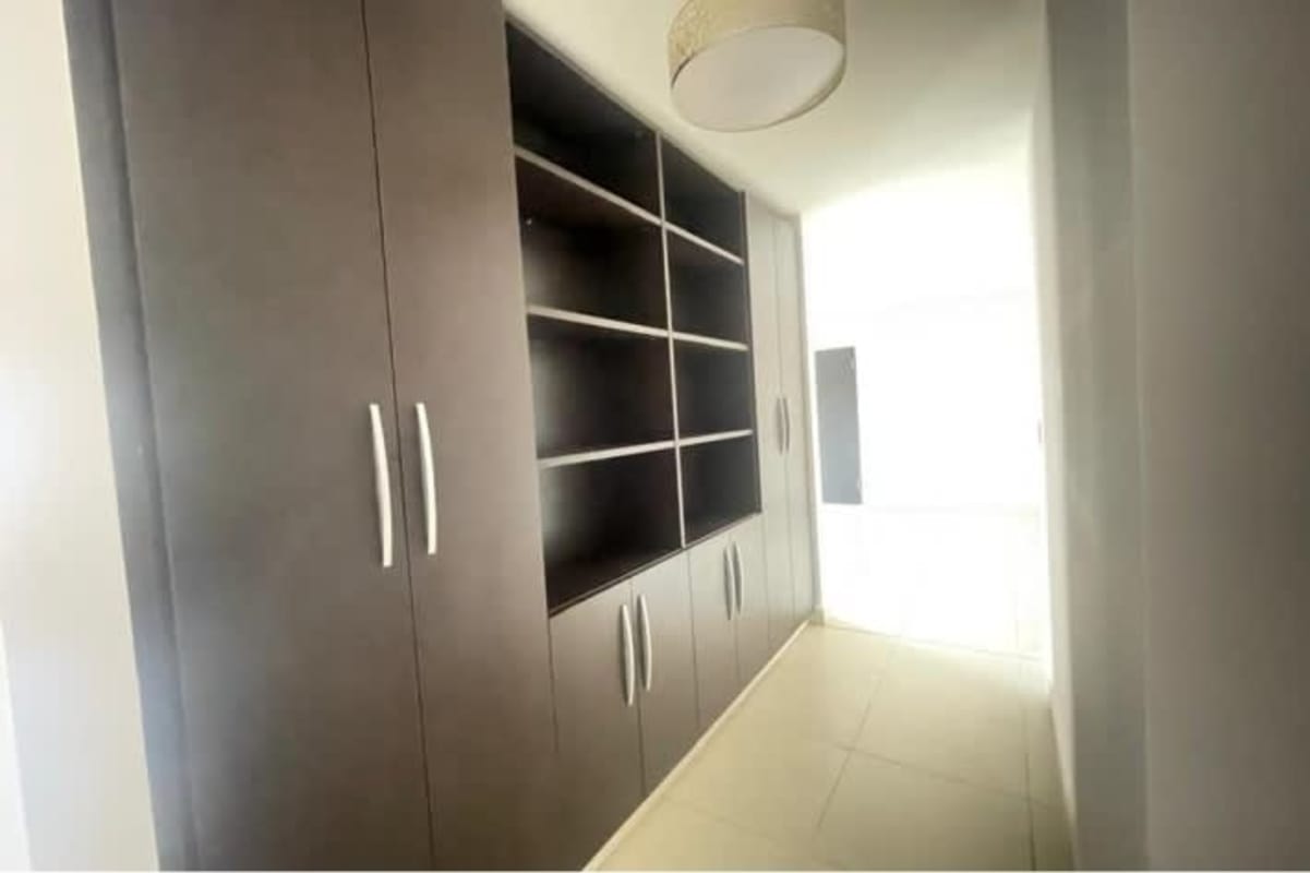Bathroom featuring luxury fixtures glass shower enclosure marble vanity at PH Clayton Residence in Panama City