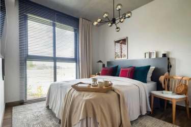 Open kitchen with granite countertop, modern cabinets at PH CENTRIQO Panama Pacifico