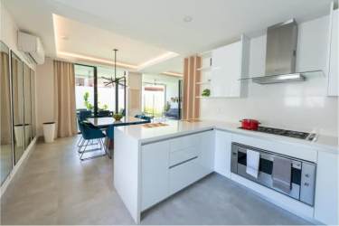 Bathroom with glass shower, modern vanity, and premium tiles in Panama Pacifico duplex