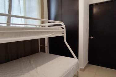 Bright living and dining room with balcony modern decor AC in Paraíso Village Panama beach apartment