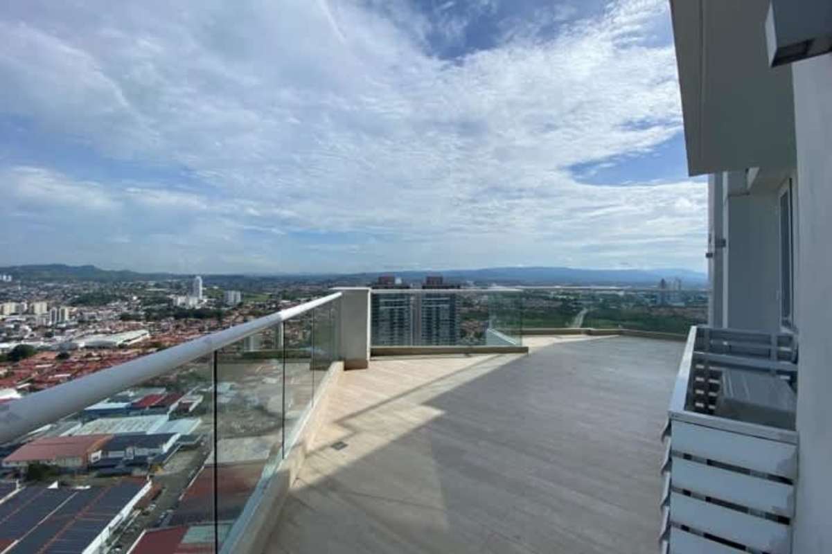 Double height luxury lobby with seating and concierge at PH Mirador Costa del Este Panama