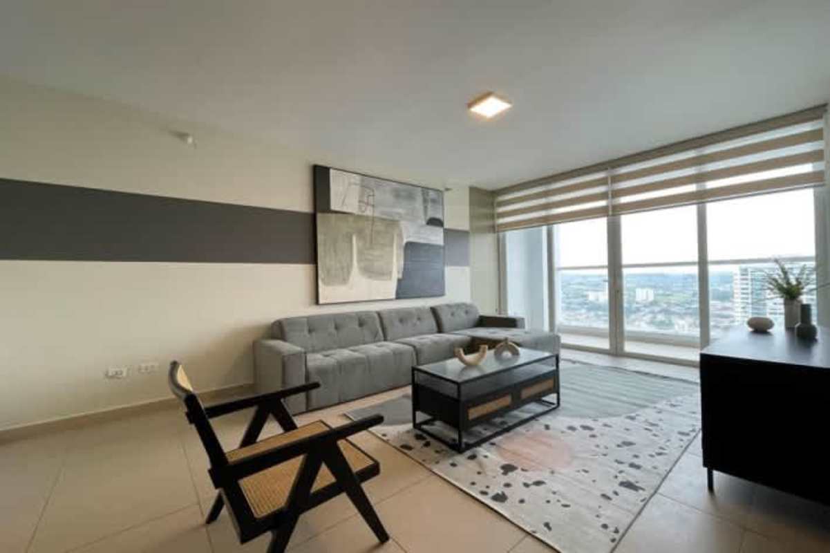 Dining room with wide windows overlooking ocean and city skyline Costa del Este Panama