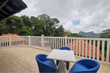 Private balcony with scenic mountain view outdoor seating Altos del María luxury home Panama