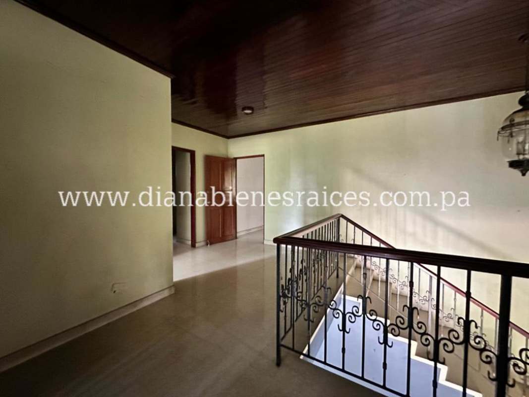 Large kitchen with cabinetry and pantry area inside El Carmen Panama house for sale