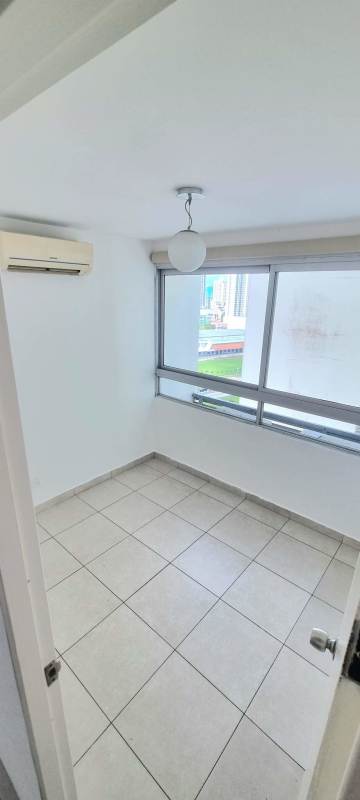 Modern kitchen in PH Terrawind with granite countertops, wood cabinets, appliances in San Francisco Panama