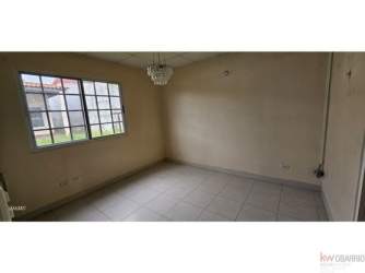 Single story home with porch and driveway Gran Reserva Montelimar Costa Verde Panama